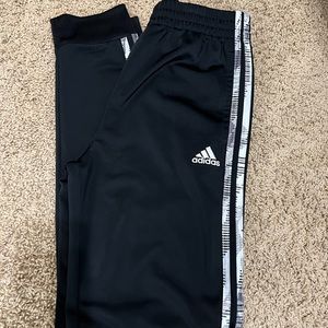 Boys Adidas track pants.